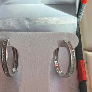 Brand new silver, and diamond earrings